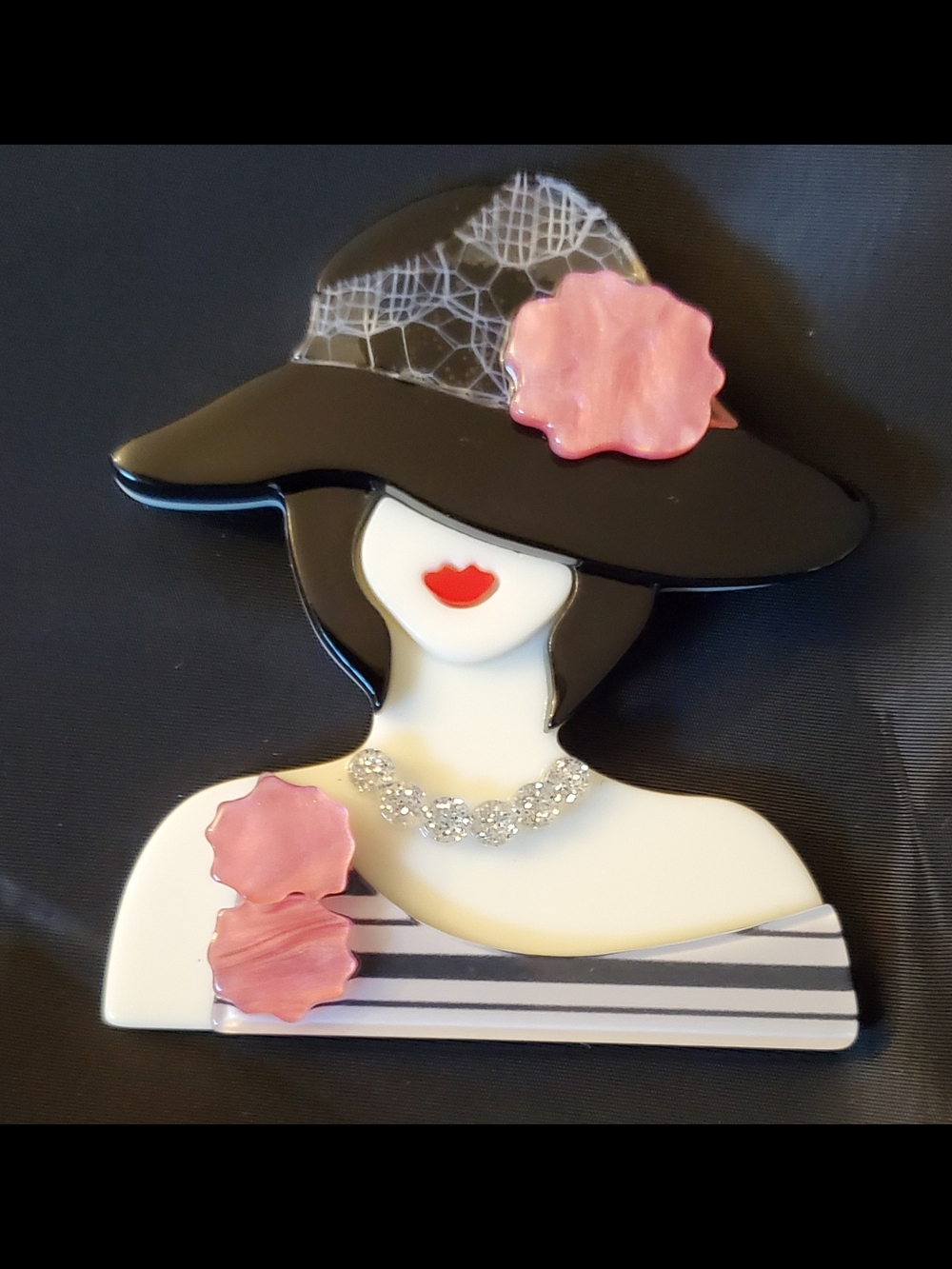 Chic Black Hat Lady Brooch with Pink Flower Accents